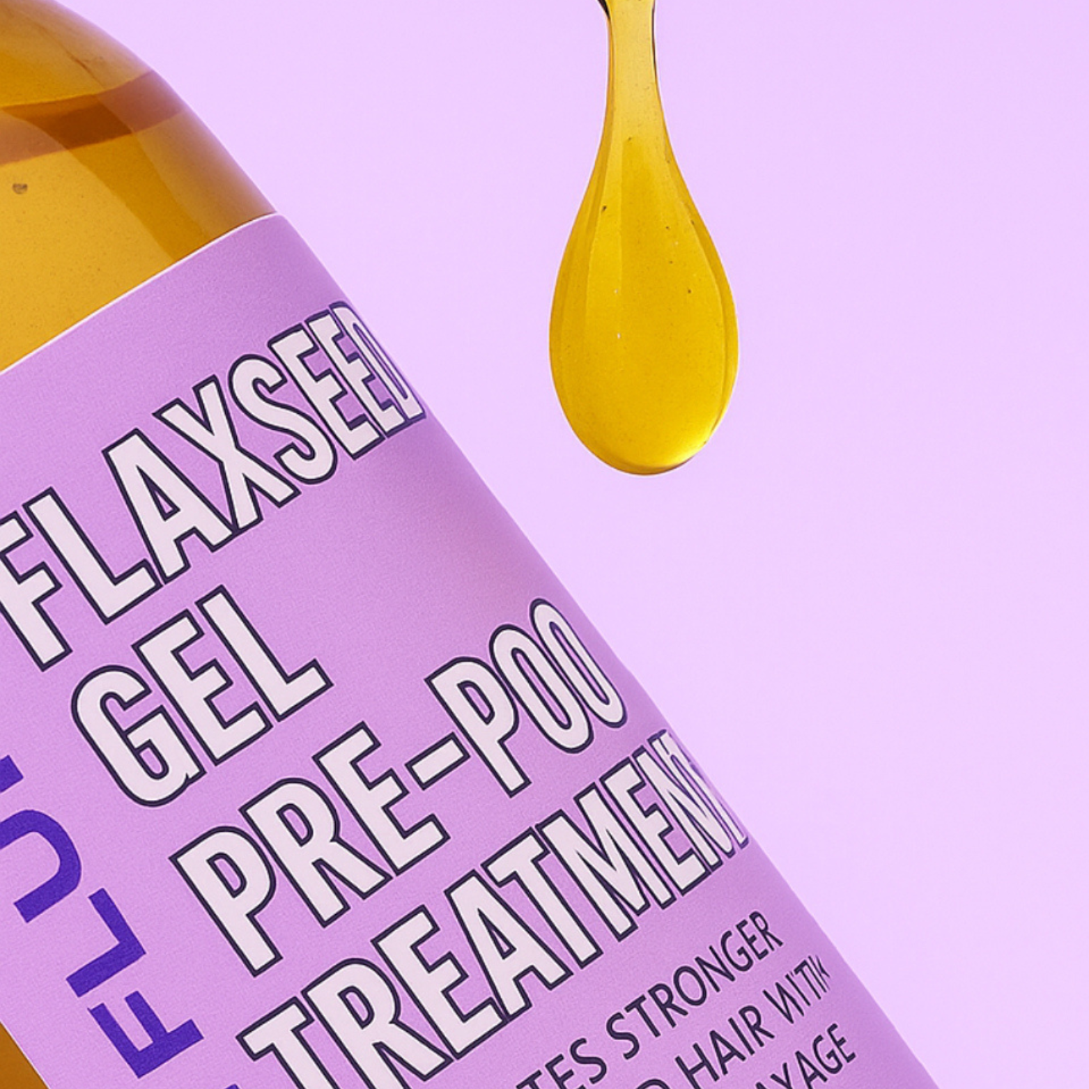 Close-up of Skynfluent Flaxseed Gel Pre-Poo Treatment bottle with a drop of oil, showing smooth texture for hair hydration