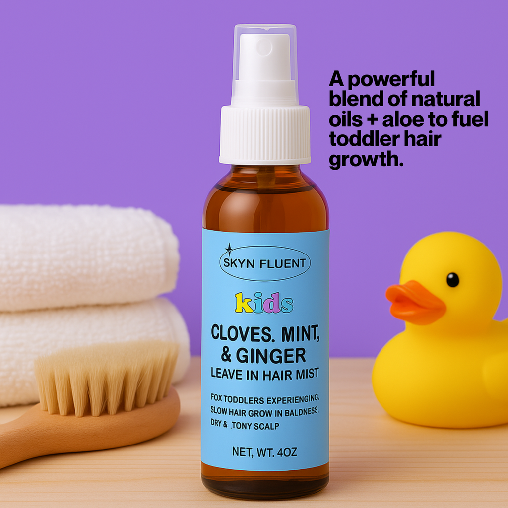Skynfluent Kids Cloves, Mint & Ginger Leave-In Hair Mist bottle placed next to a baby brush, towel, and yellow rubber duck, highlighting its toddler-friendly formula.
