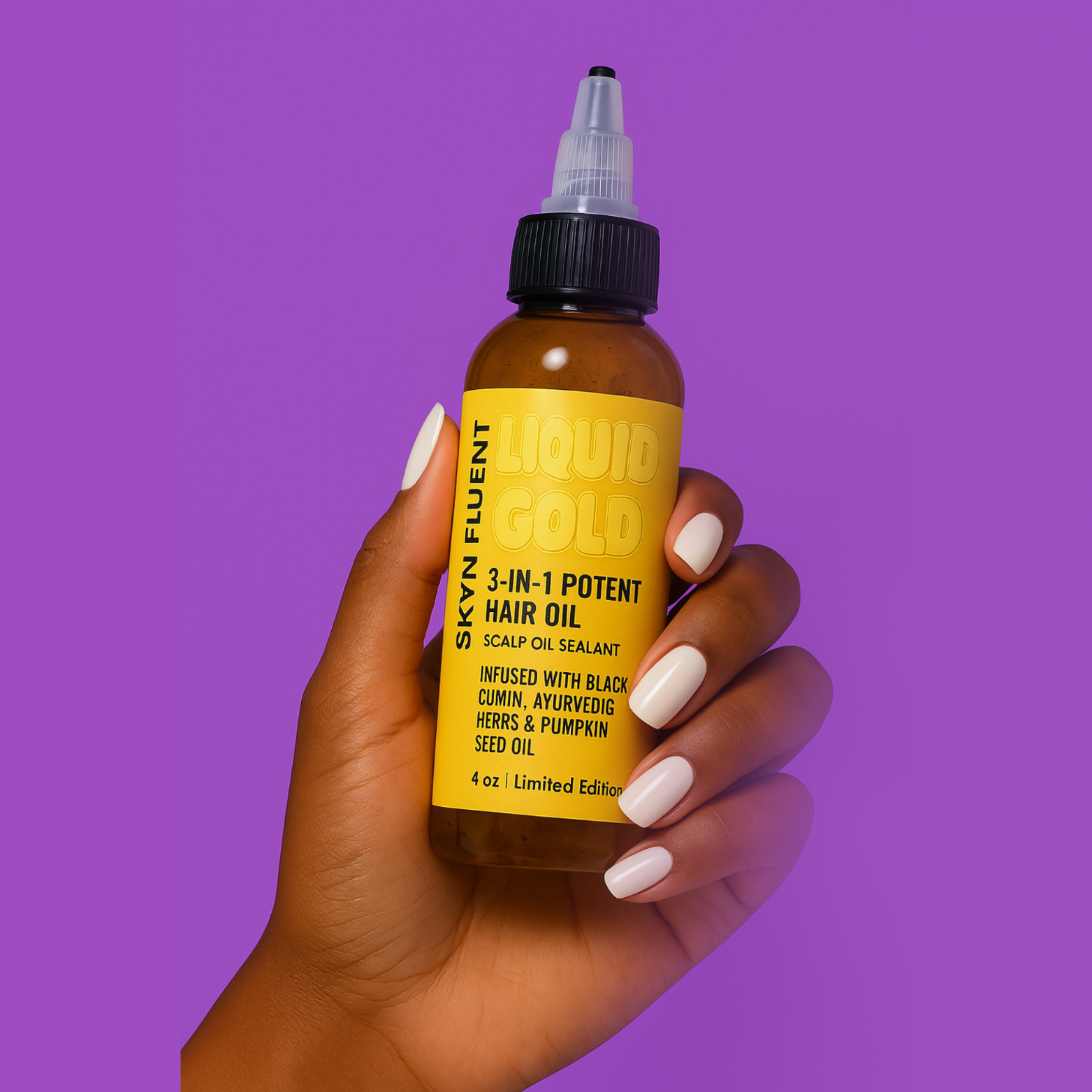 Skynfluent Liquid Gold 3-in-1 Hair Oil bottle held in hand on purple background – infused with black cumin, Ayurvedic herbs, and pumpkin seed oil.